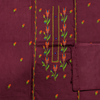 Maroon fabric with colorful floral embroidery